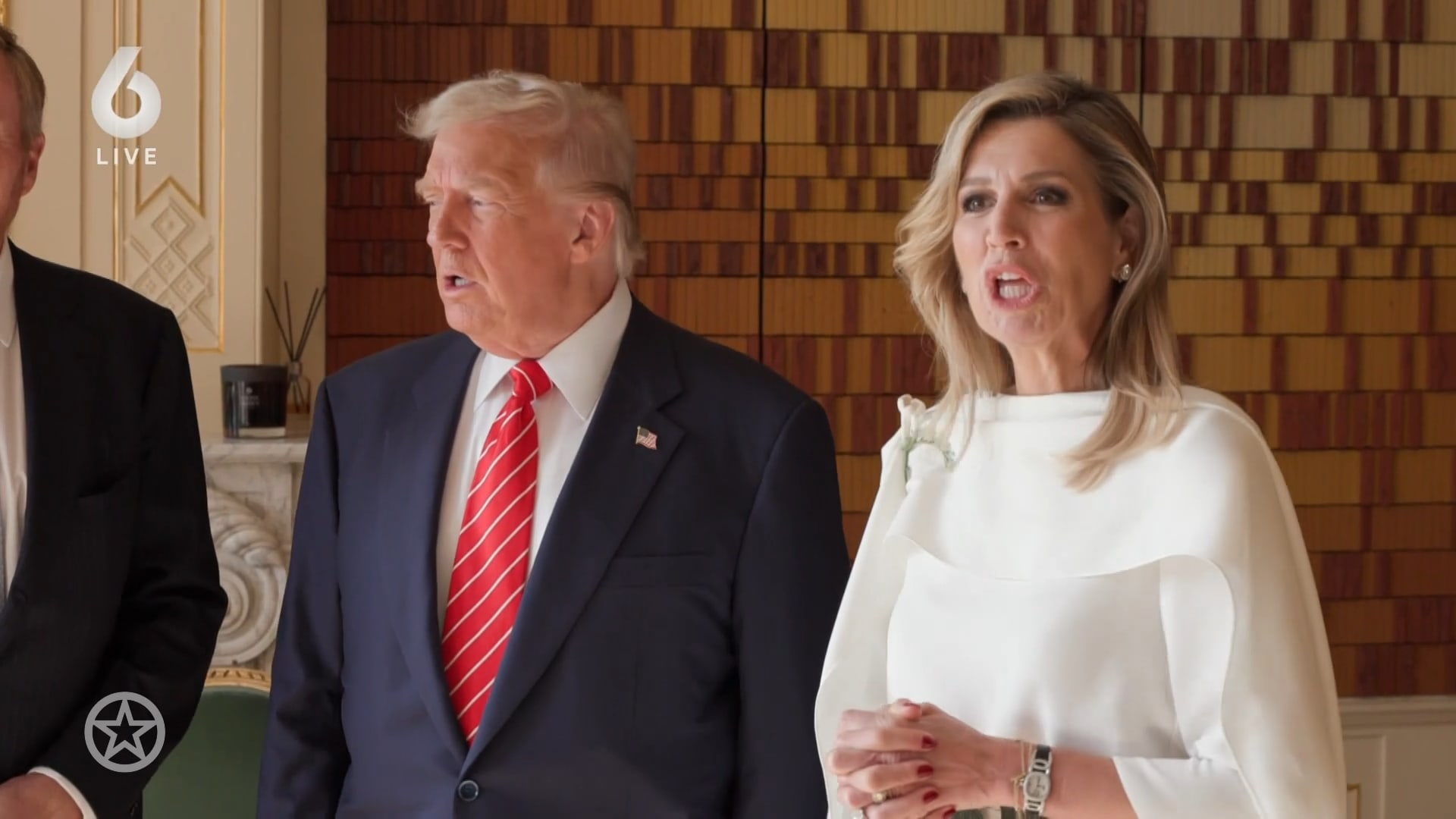 Máxima maakt opvallende mondbeweging naast Trump
