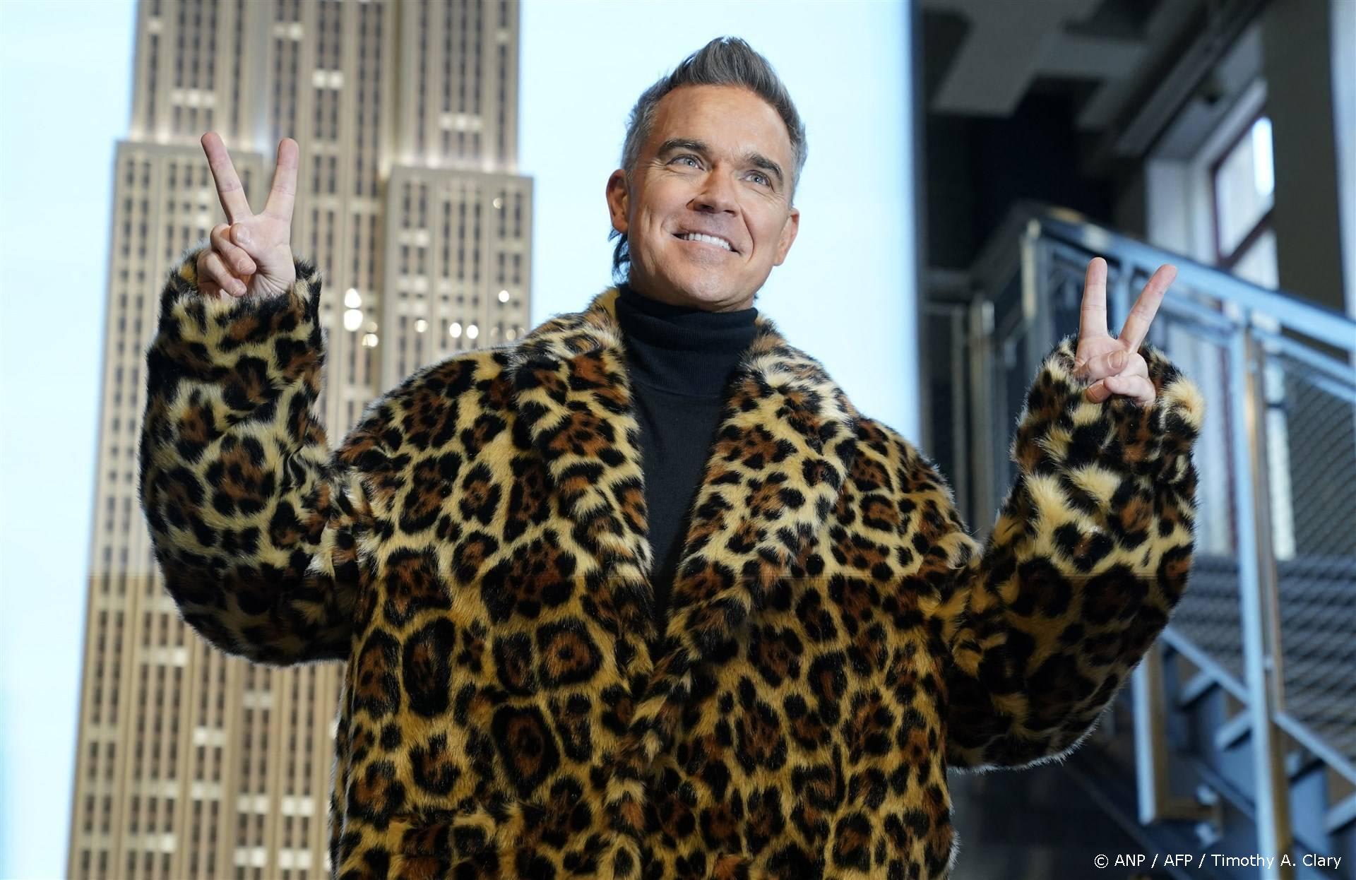 Bijzondere verschijning op podium tijdens concert Robbie Williams |  Shownieuws