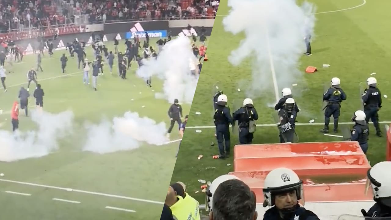 Video: hooligans bestormen veld na topper tussen Olympiakos en AEK 