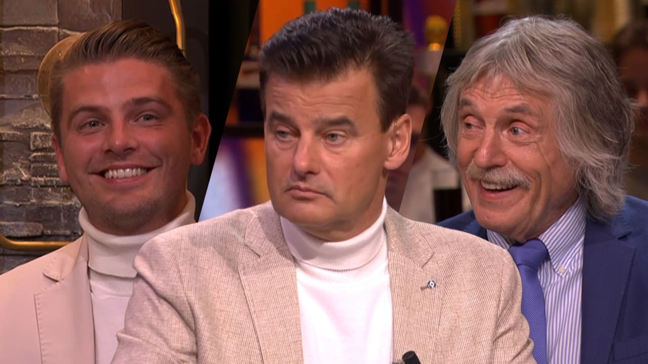Johan spot man in publiek met dezelfde coltrui als Wilfred