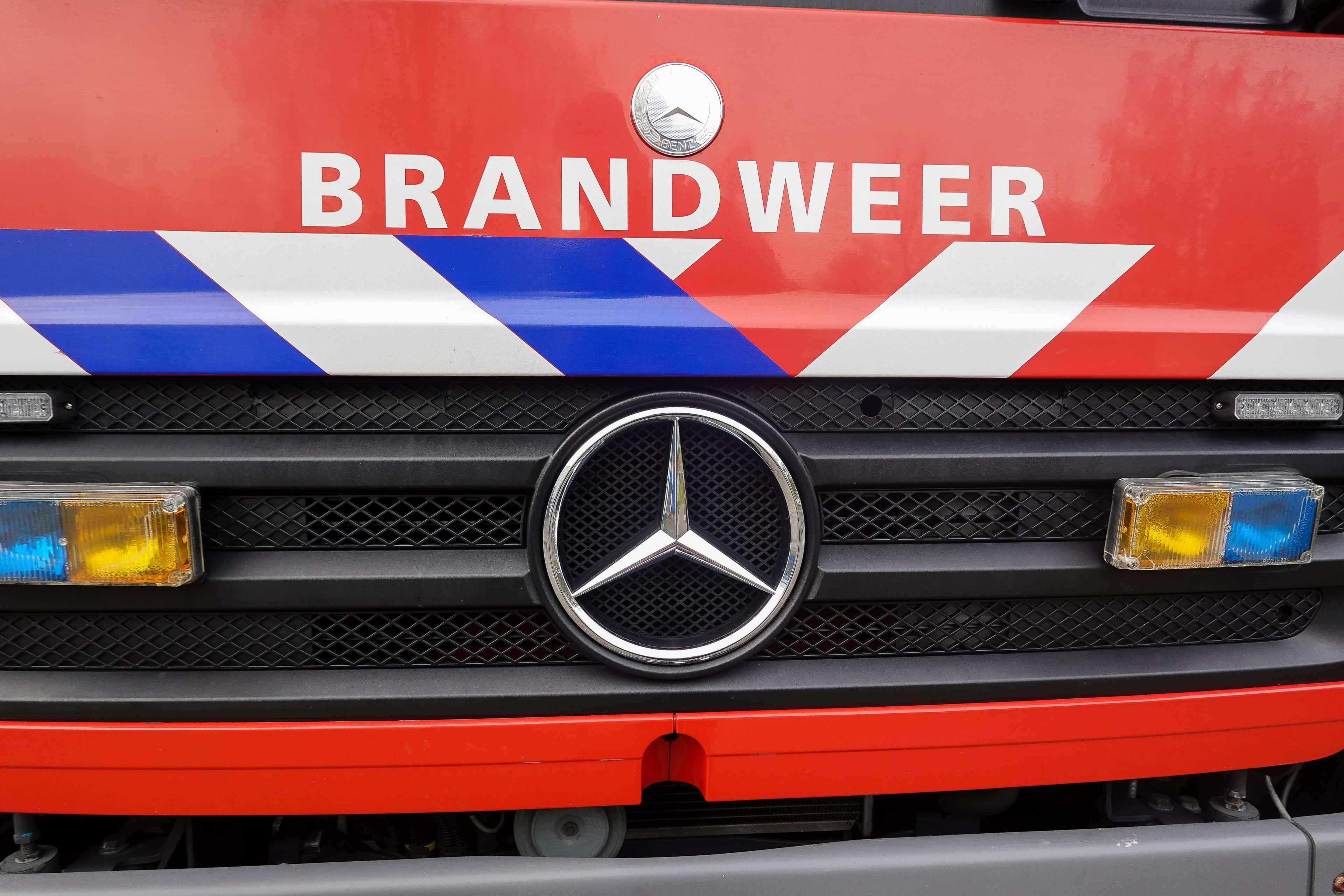 Bewoner via balkon uit woning Den Haag geëvacueerd vanwege brand