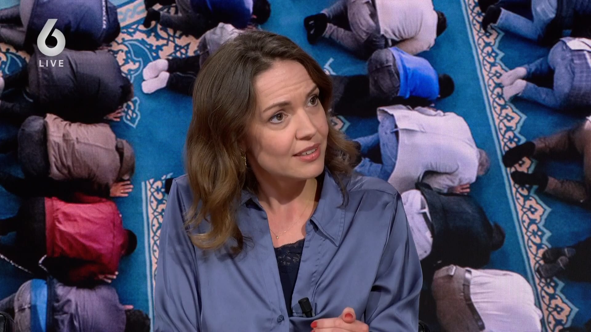 Kamer debatteert over integratie: 'Pas na tien jaar een Nederlands paspoort'