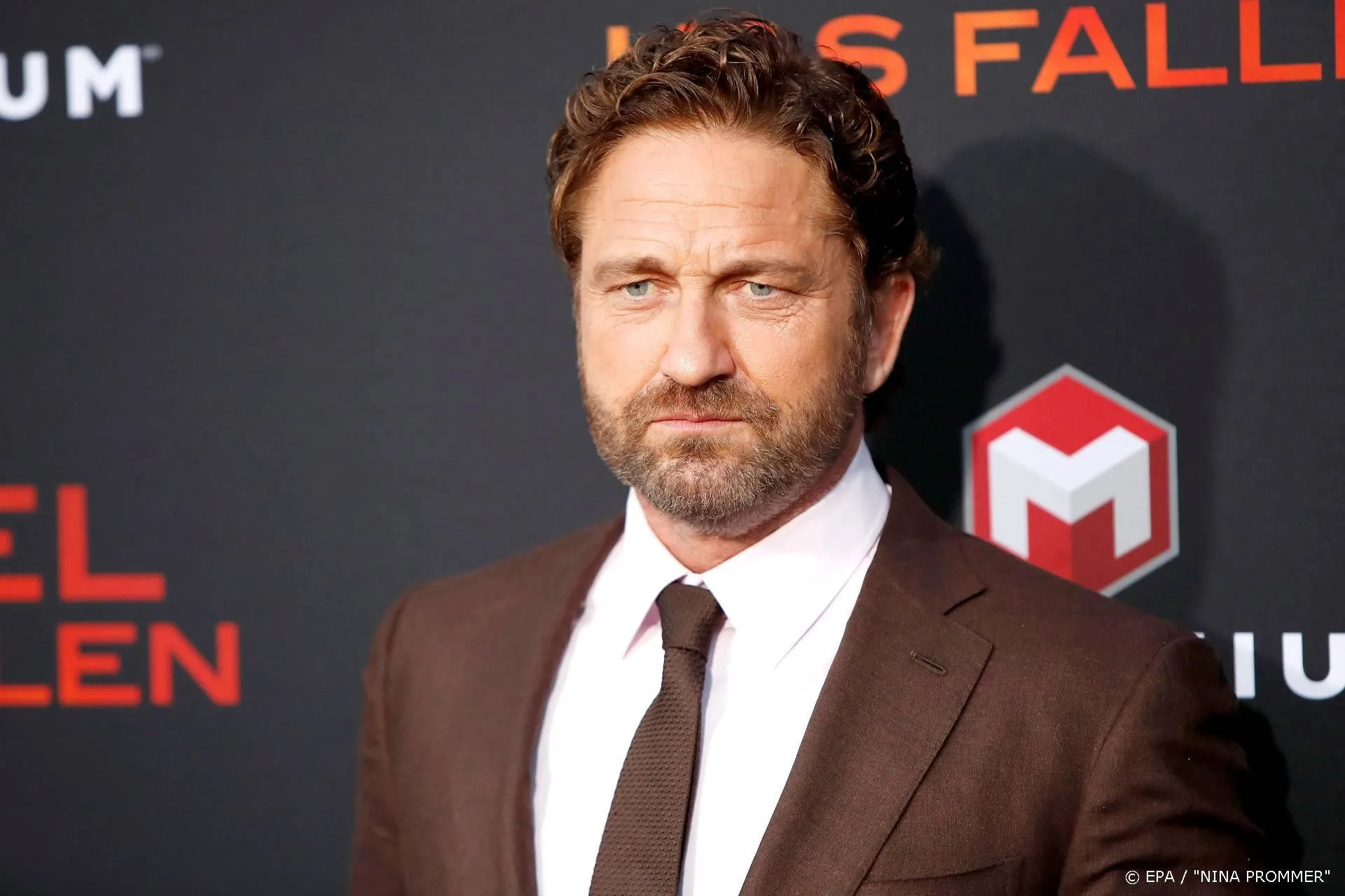 Gerard Butler draagt olympische fakkel voor Sparta