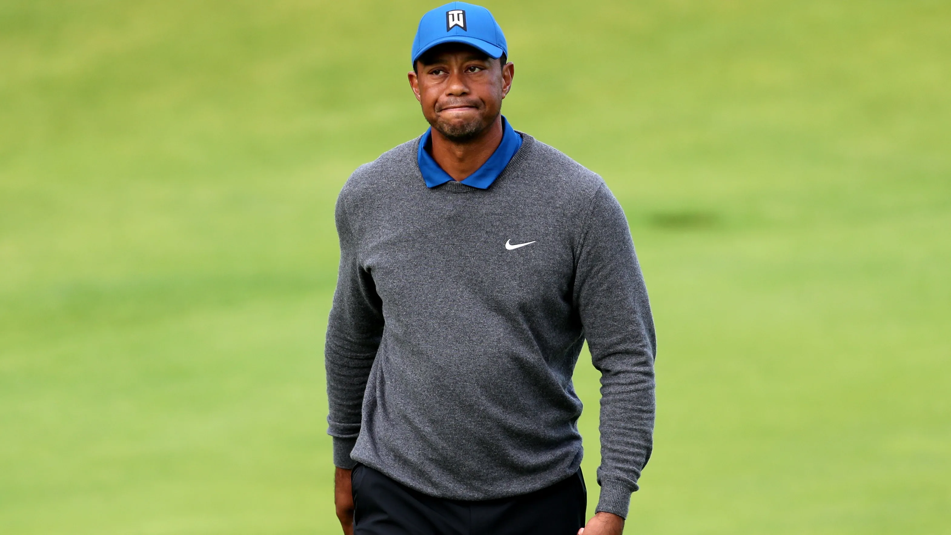 Tiger Woods bij kennis na spoedoperatie