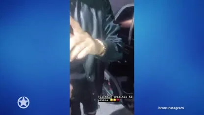 Lil' Kleine wast auto met champagne