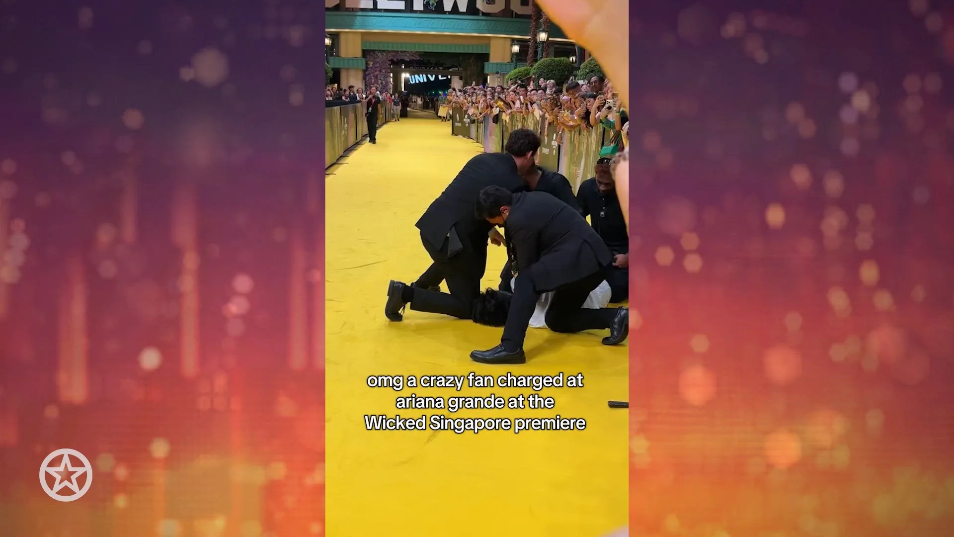 Fan die op Ariana Grande afstormde van de loper gehaald