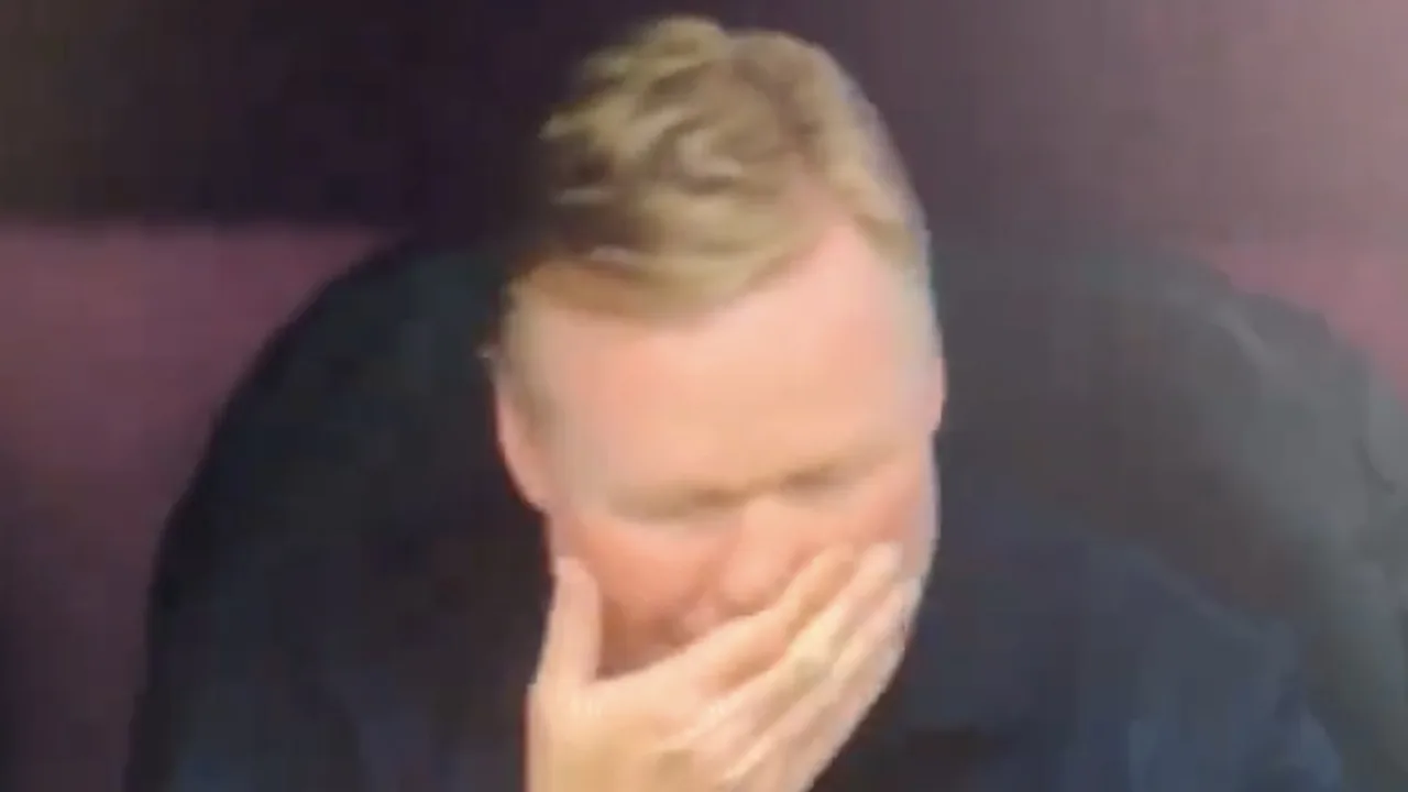 Beelden van Koeman op de bank tijdens Polen-Nederland gaan snel rond op social media