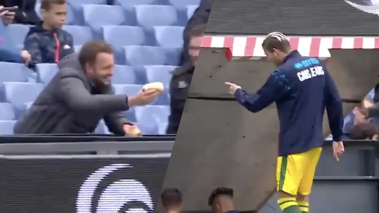 Kramer krijgt broodje kroket aangeboden in De Kuip