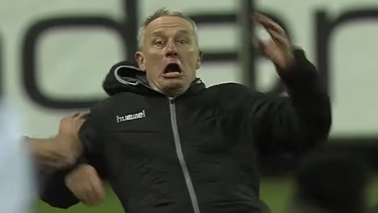 BIZAR! Frankfurt-aanvoerder beukt Freiburg-coach omver 