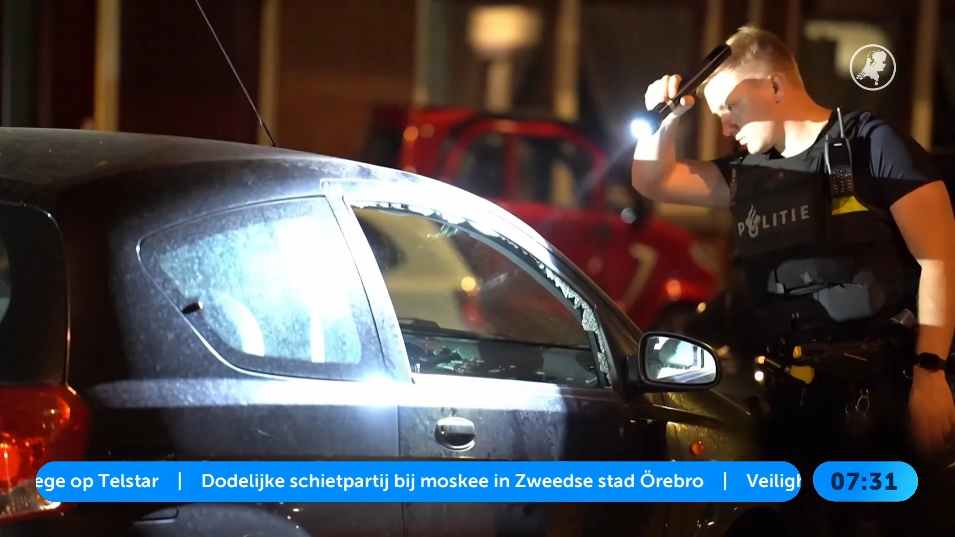 Auto beschoten in Rotterdam, twee gewonden