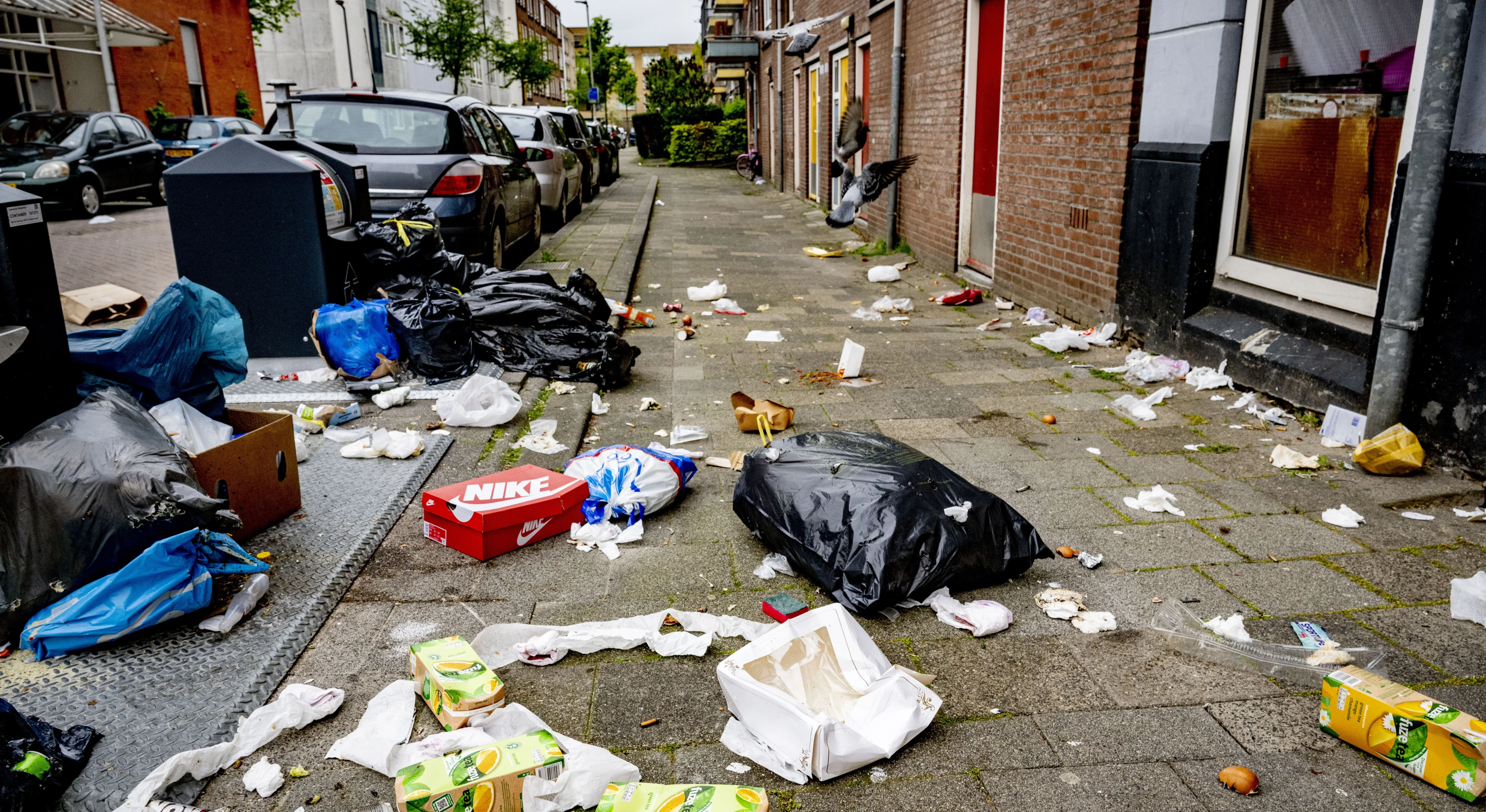 'Rotterdammers moeten meer gaan betalen voor smerige buurt'