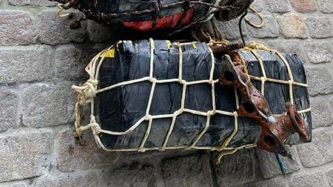 Duikers vissen 128 kilo cocaïne op onder Braziliaans zeeschip in Amsterdamse haven