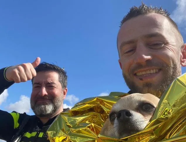 John redde hond na val van pier, reddingsbrigade noemt actie 'levensgevaarlijk'