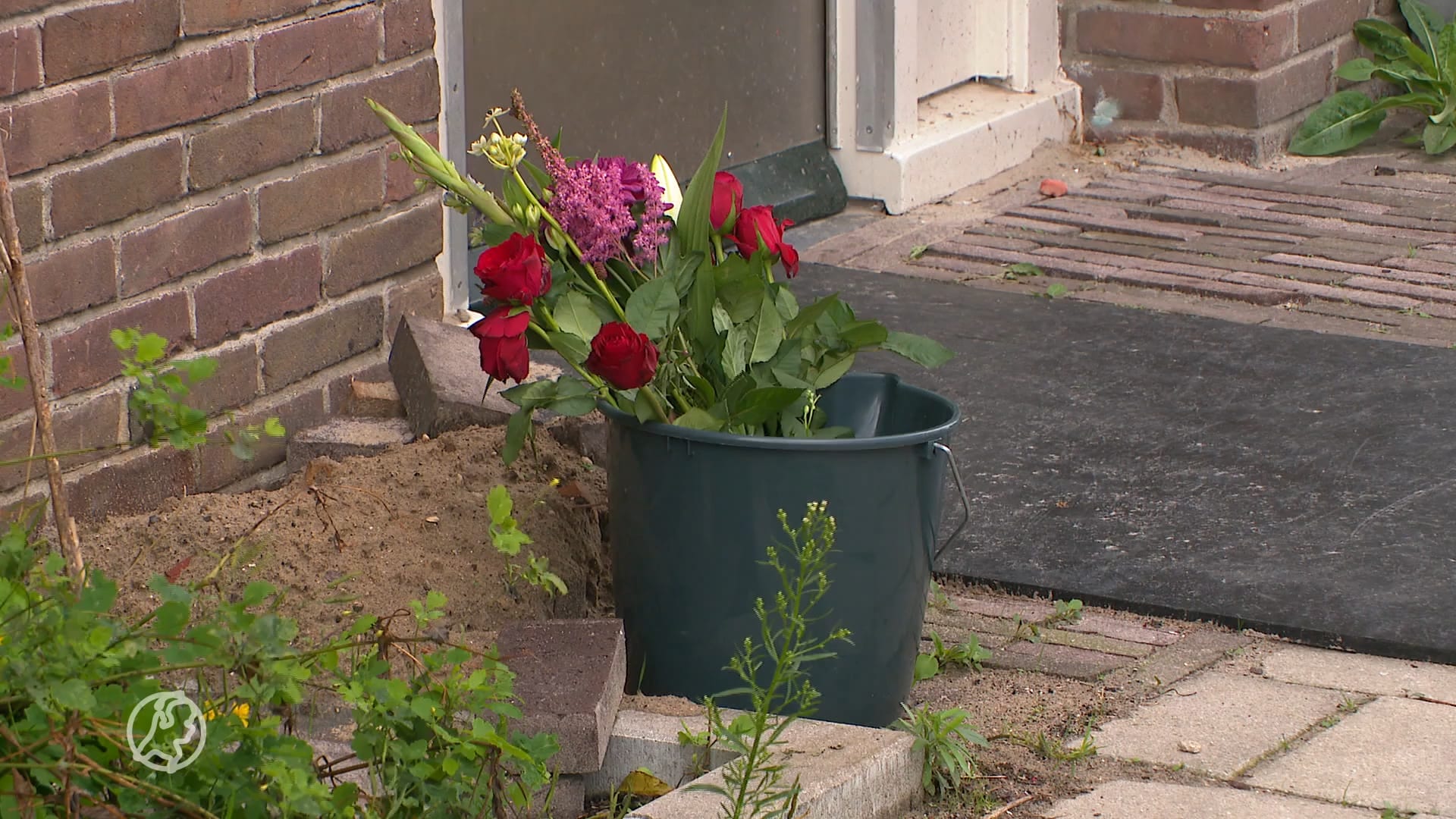 Bloemen bij huis steekpartij Amsterdam