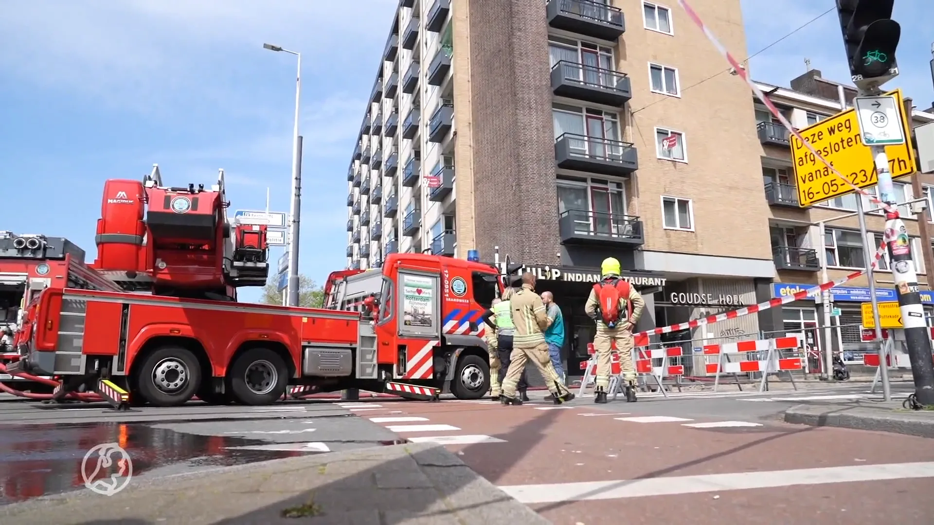 Aanhouding na aantreffen vuurwapens bij woningbrand
