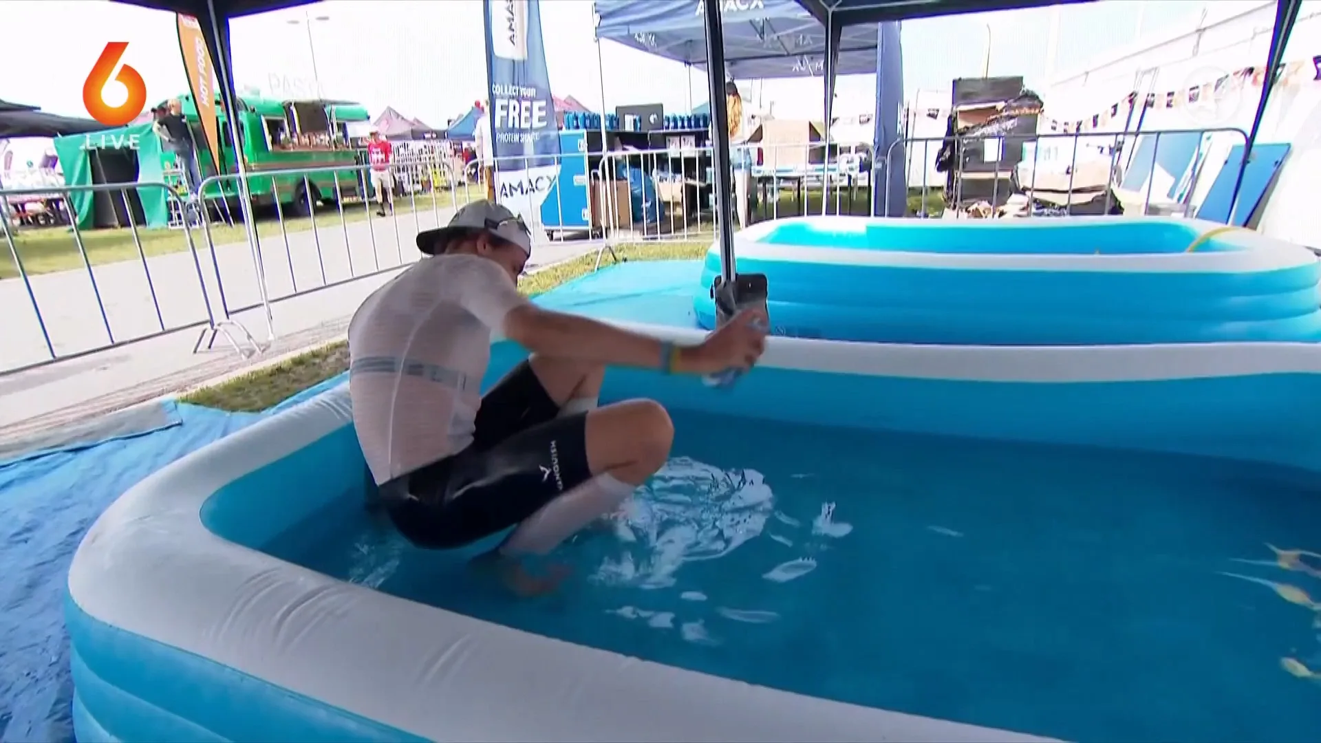 Duizenden deelnemers trotseren hitte tijdens grootste triatlon van Nederland