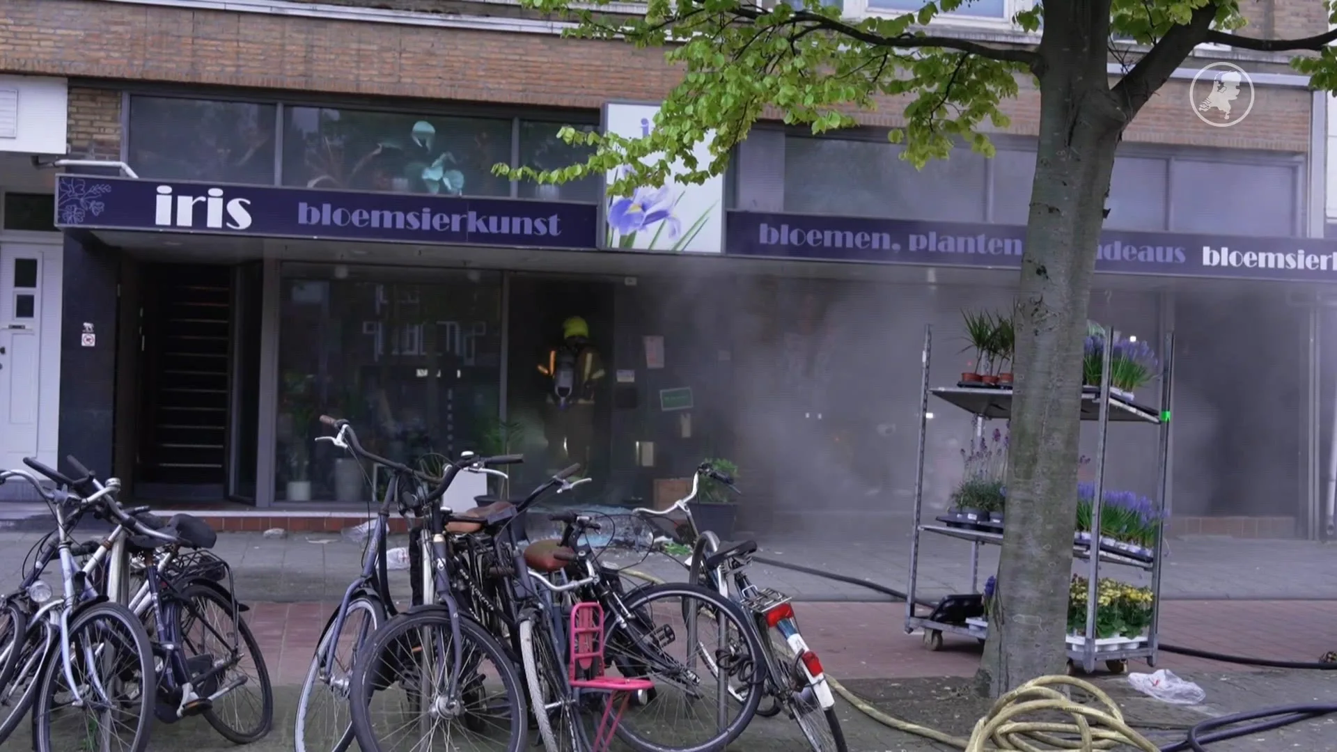 Woningen Schiedam ontruimd om brand in winkel