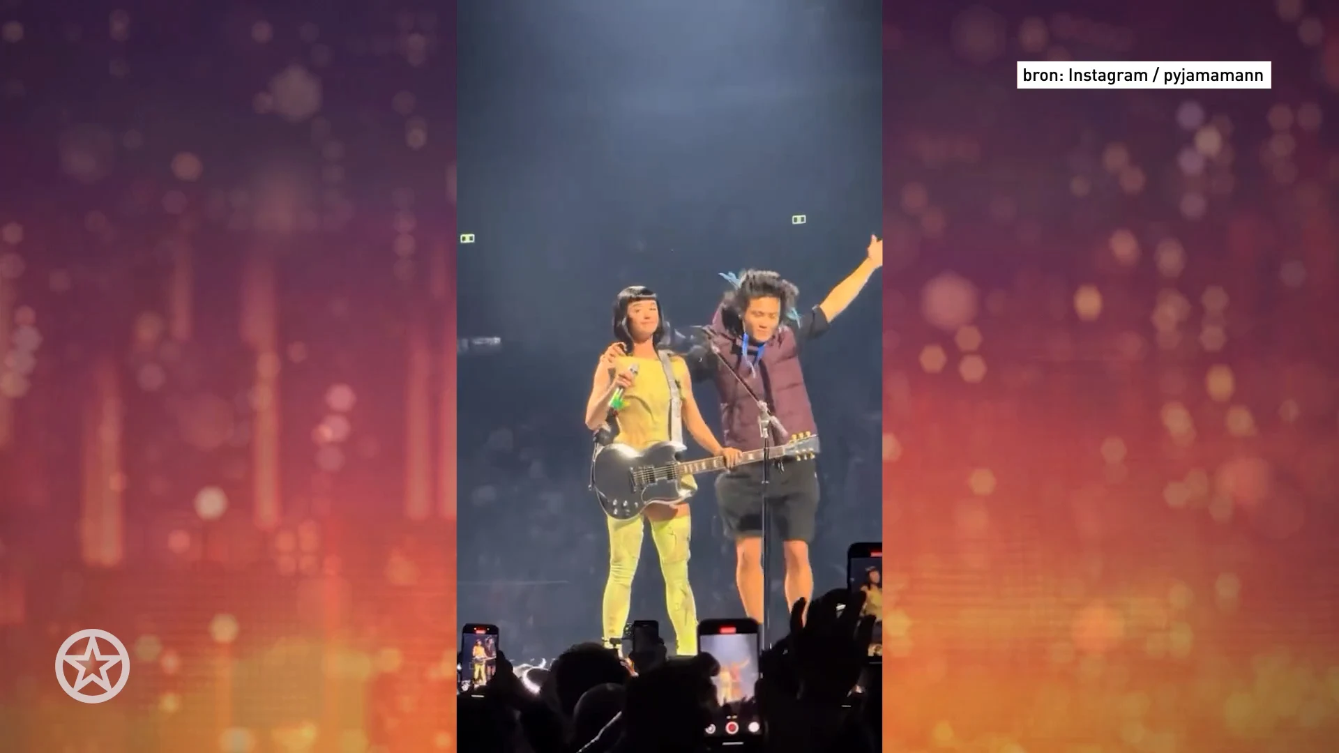 Fan ongevraagd op het podium bij Katy Perry beland