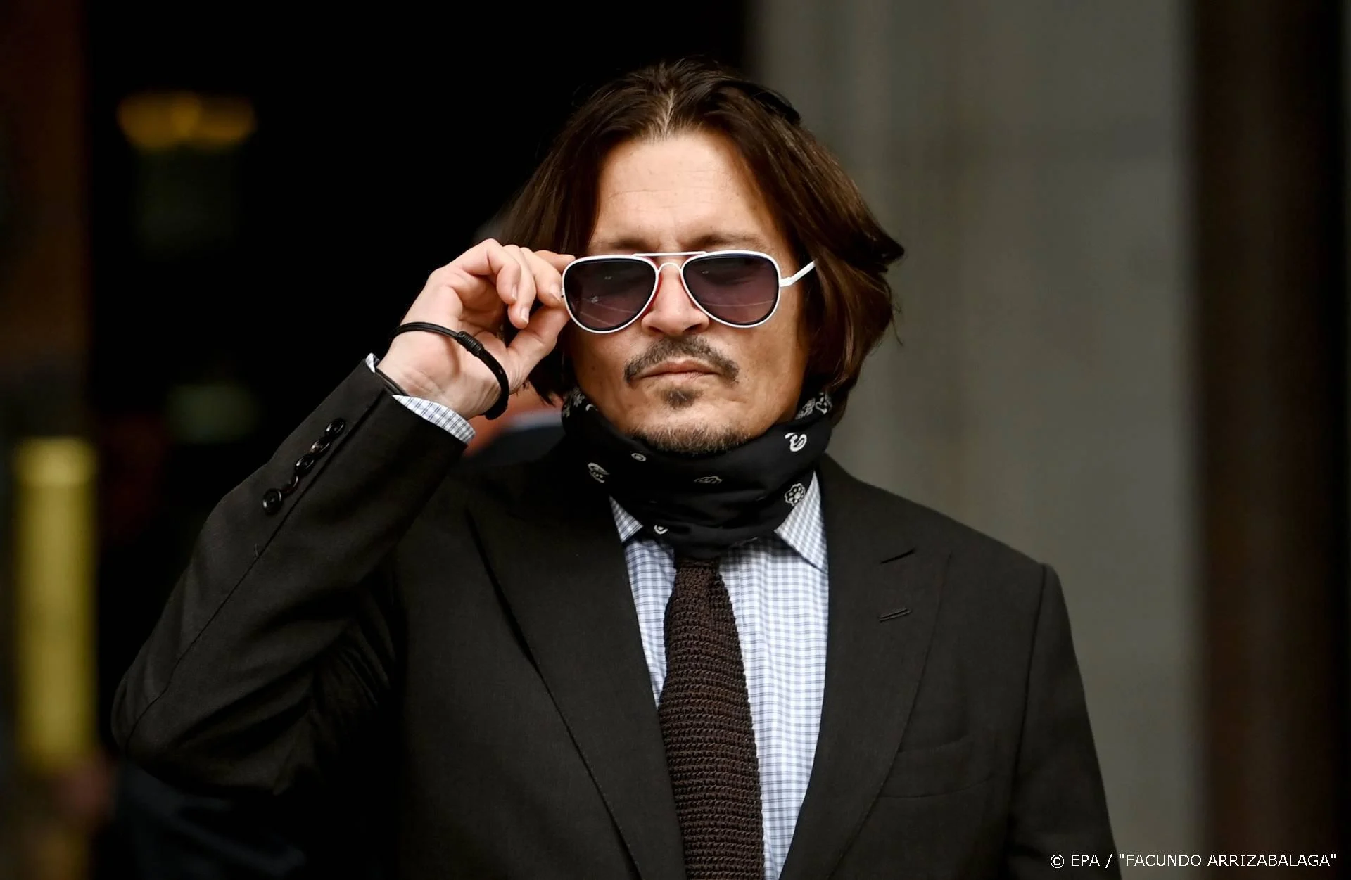 Johnny Depp toont foto's vernielde keuken in rechtbank