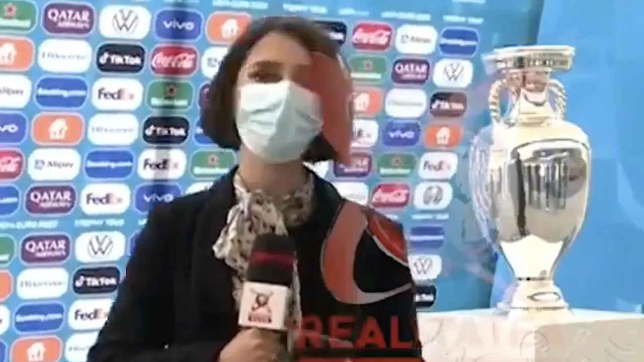 VIDEO: EK-trofee waait hard omver live op Roemeense televisie