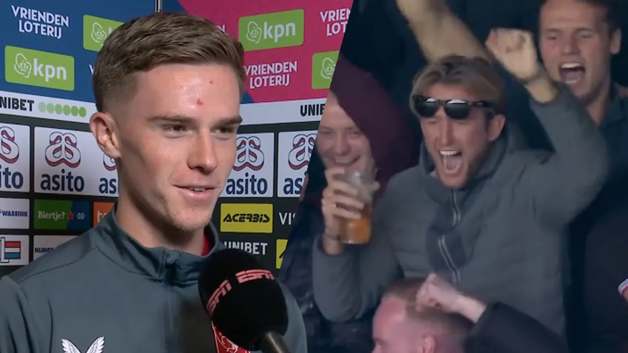 Rots lacht om teamgenoot Vlap op tribune: ‘Past er perfect tussen met z’n Stone Island-jas’