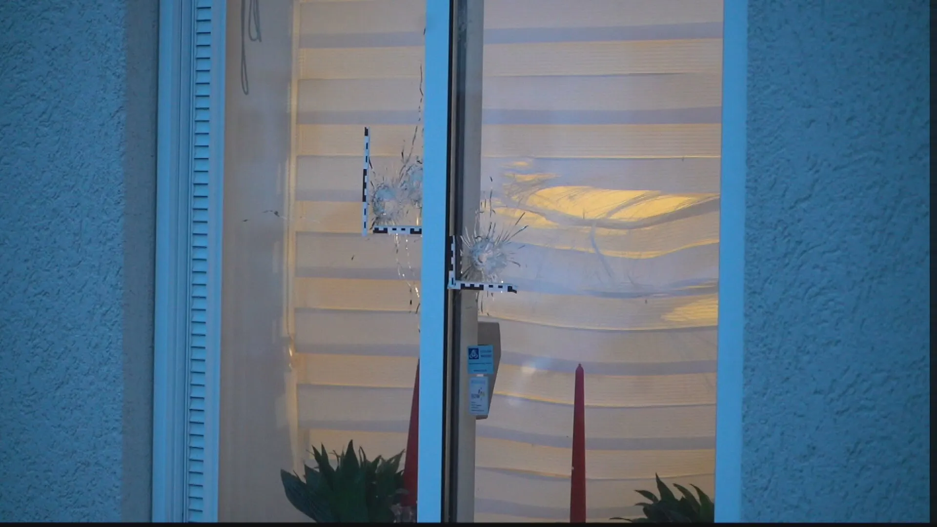 Woning in Rotterdam beschoten, meerdere kogelgaten in ruit