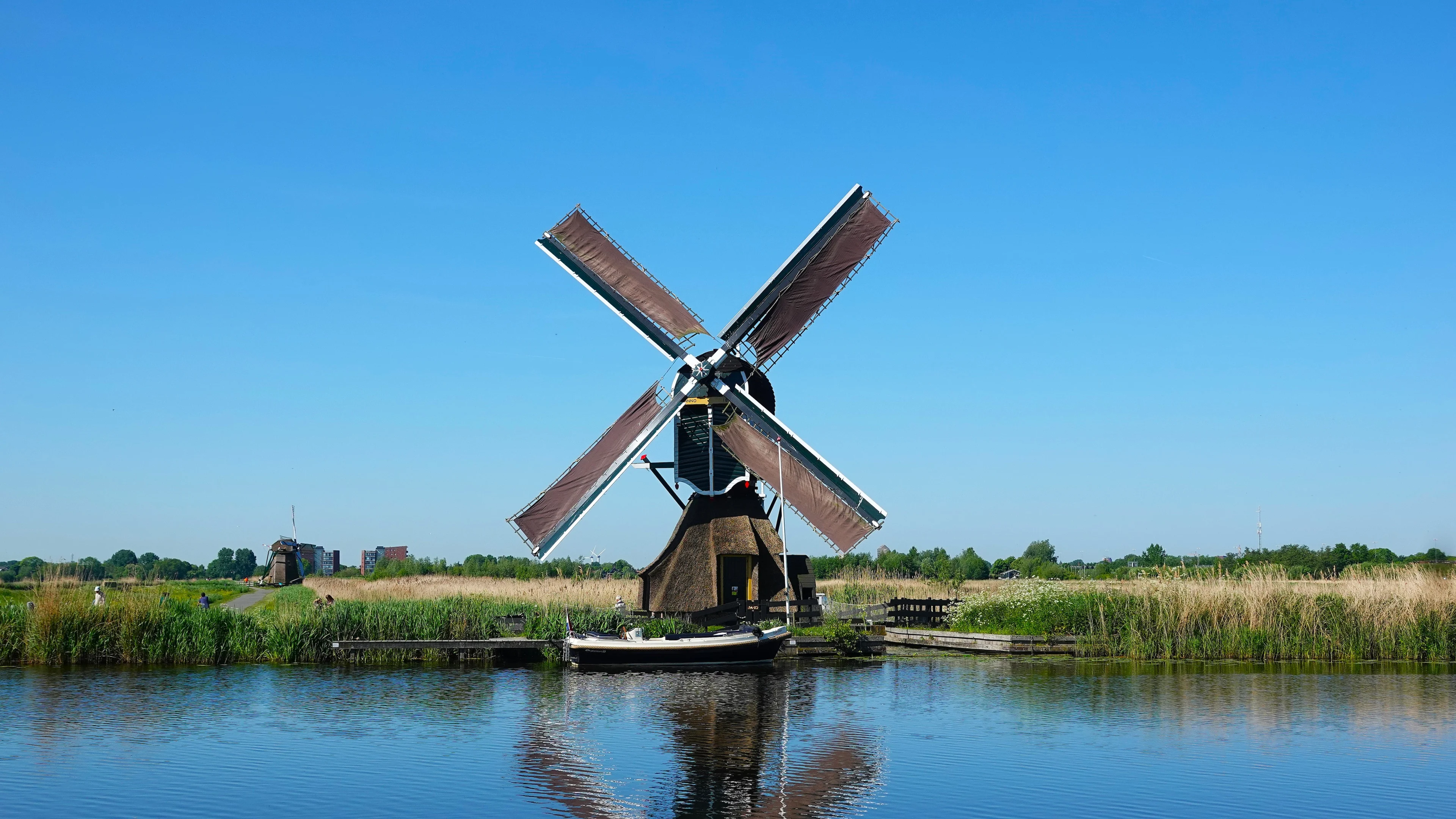 Donderdag veel zon aan de kust en zomerse temperaturen, zondag kan nat uitpakken