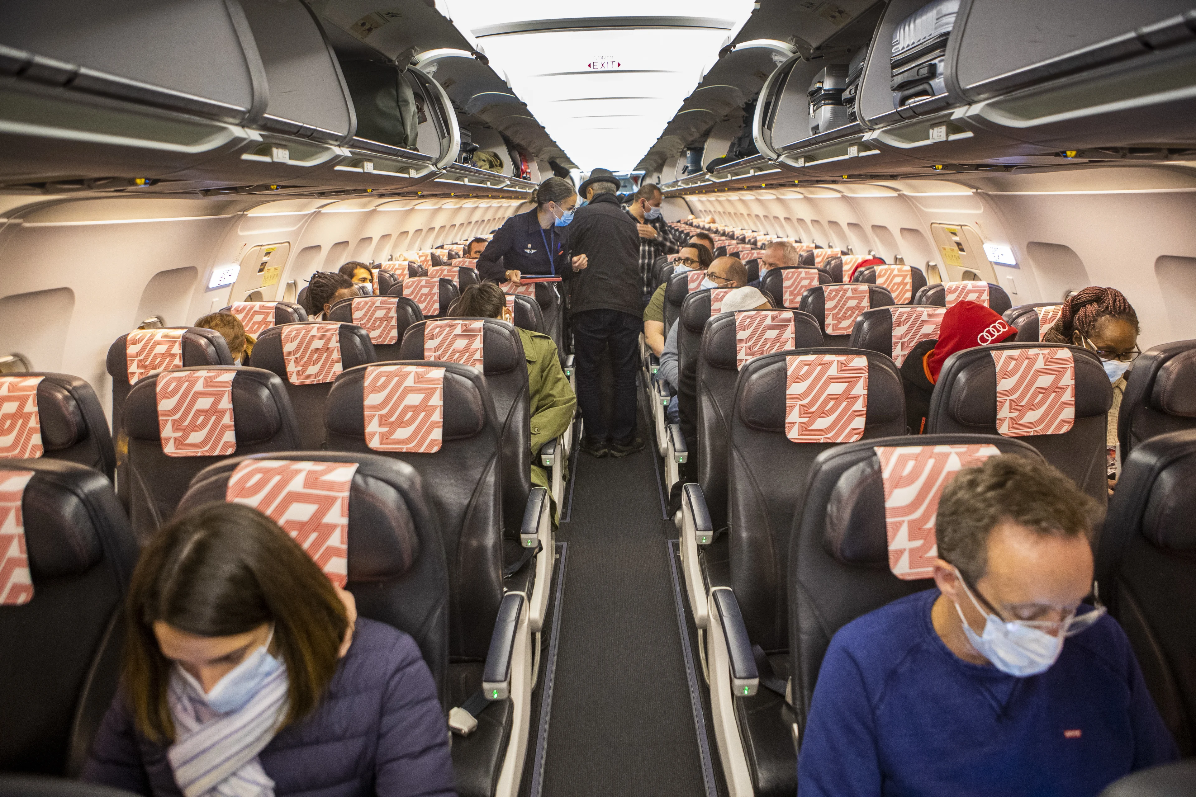 Zeker 80.000 vliegtuigpassagiers zaten nabij besmette medereiziger