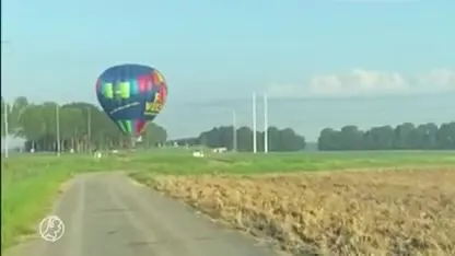 Gezin scheert over snelweg tijdens ballonvaart