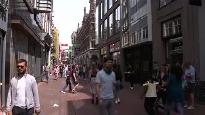 Mondkapje wordt verplicht op drukke plekken in Amsterdam en Rotterdam