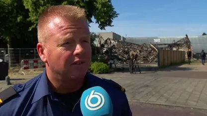 Enorme brand massagesalon Groningen, 40 woningen ontruimd