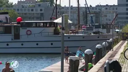 Amsterdammers in actie tegen zwemverbod bij steiger: 'Dit is geen overlast maar pret'
