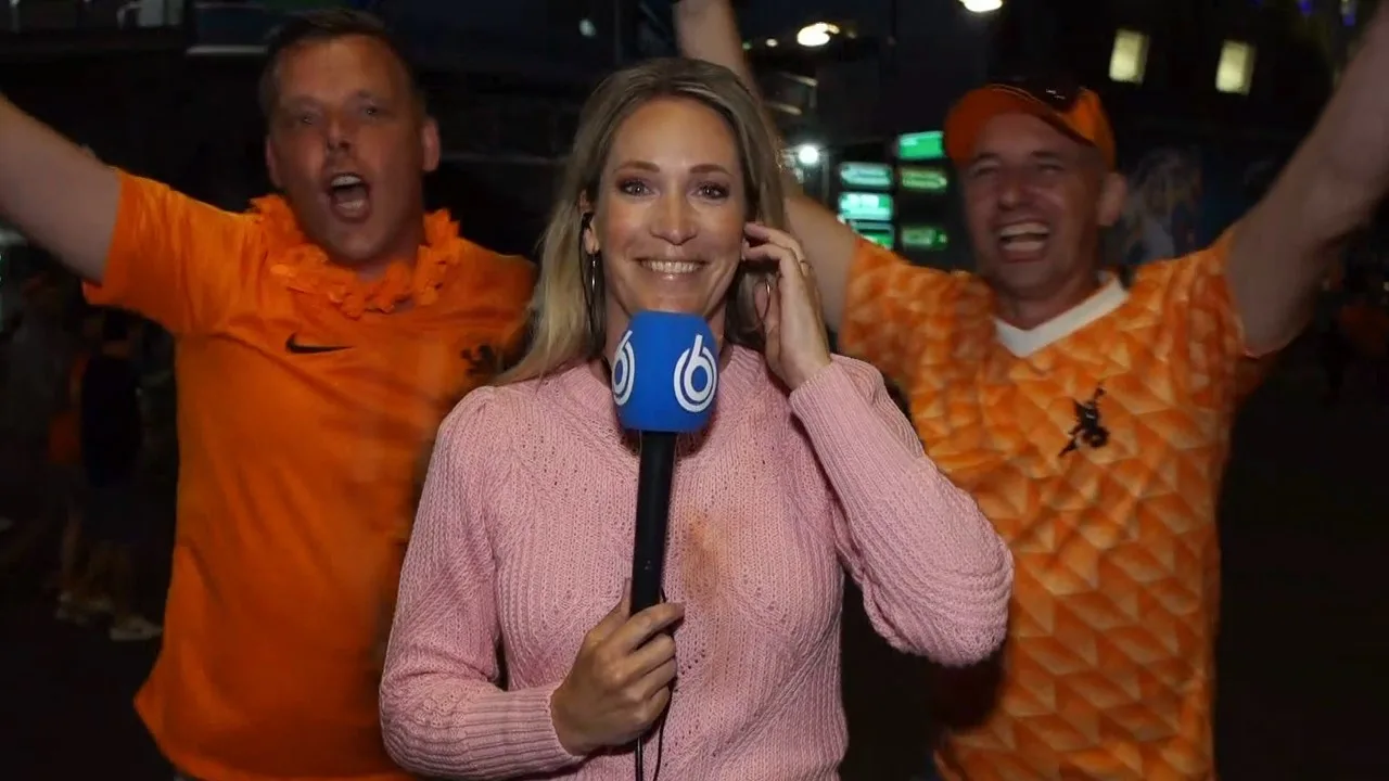Crosstalk Hélène abrupt onderbroken door feestende Oranje-fan...