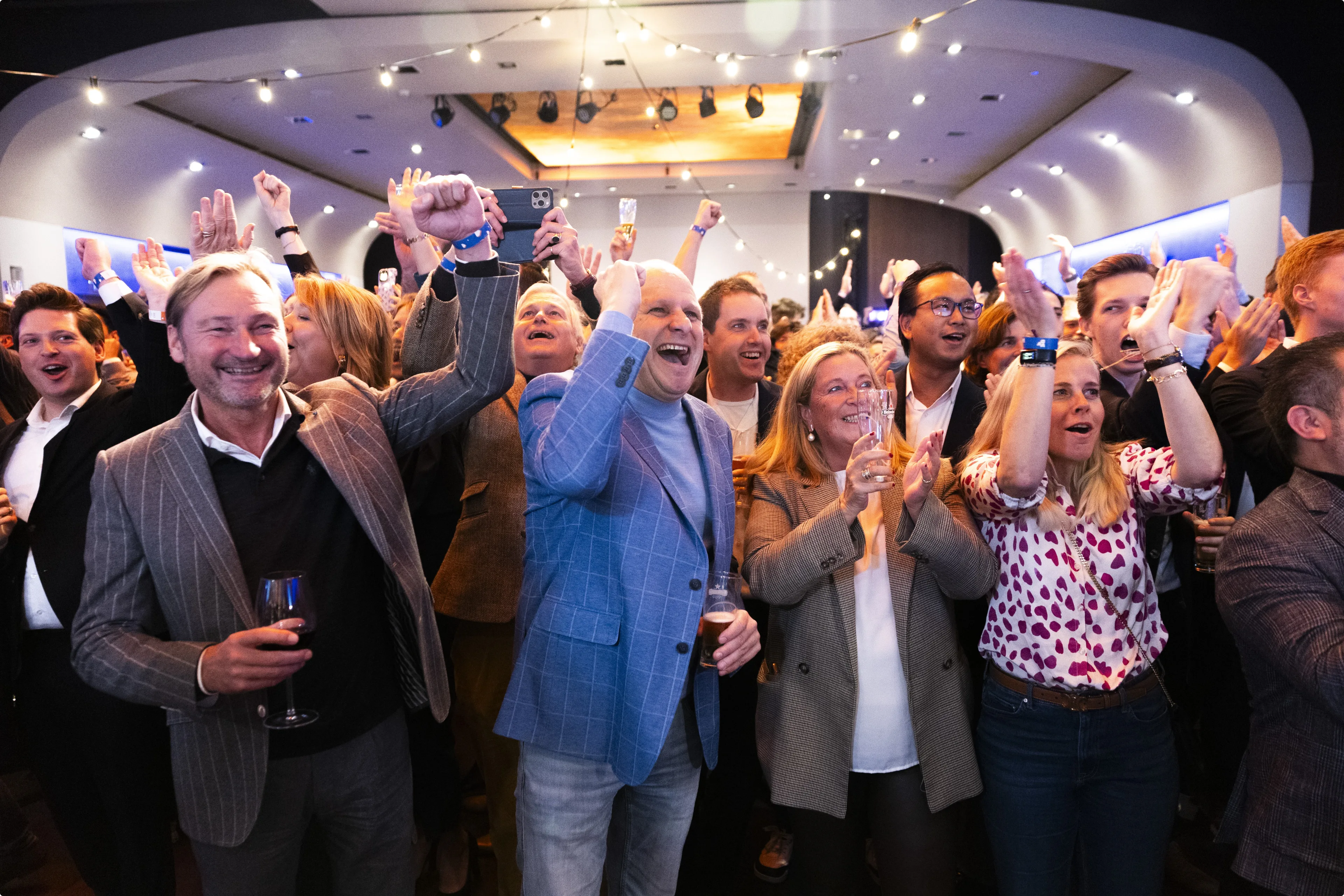 Dubbel gejuich bij VVD om eerste exitpoll. Beeld: ANP