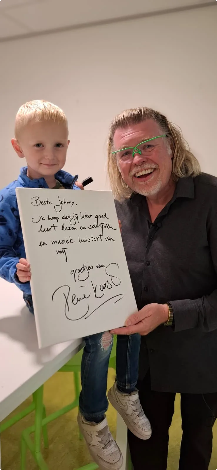 Zoontje Johnny samen met René Karst. Beeld: Gea Mulder